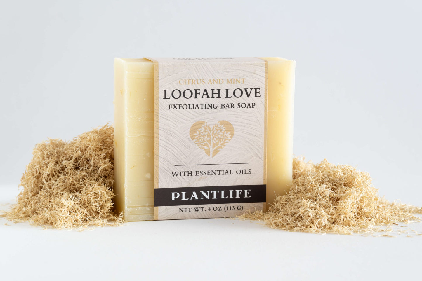Bar of soap with 'Loofah Love' packaging on a light background