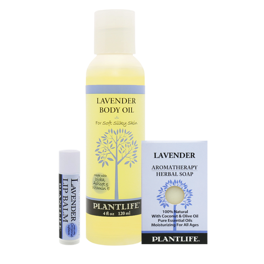 Plantlife Lavender gift set including a lip balm, 4 oz body oil, and aromatherapy herbal soap; all-natural products made with essential oils and plant-based ingredients for moisturizing and skin nourishment.