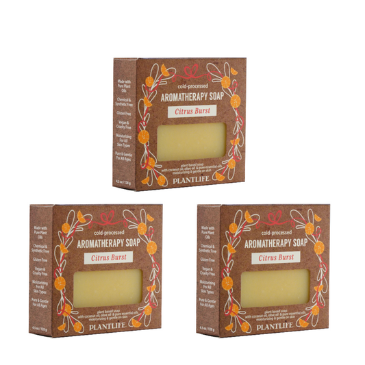 Three boxes of Plantlife Aromatherapy Soap with a bar of Citrus Burst soap inside on a white background