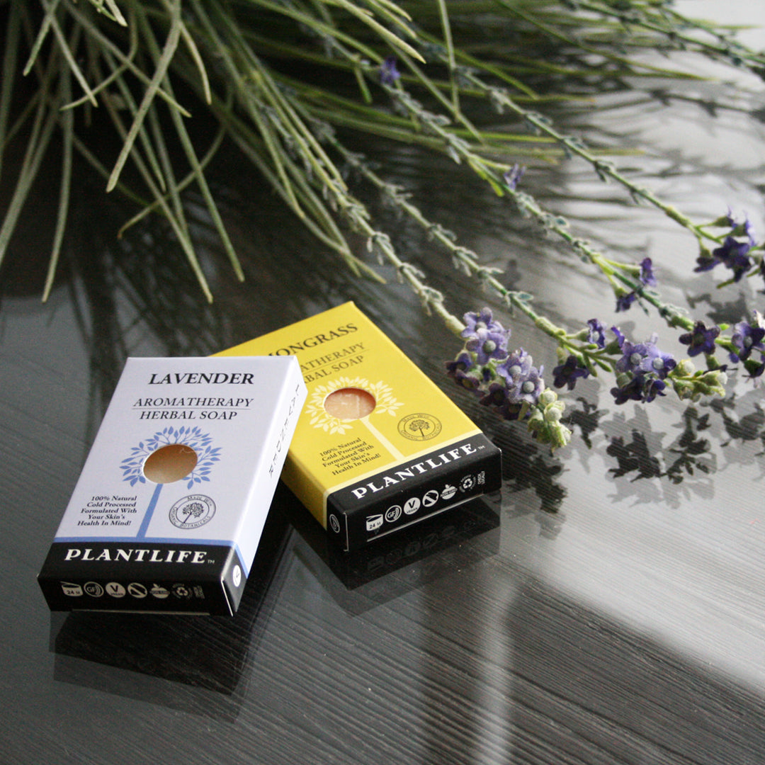 Plantlife Lavender and Lemongrass Aromatherapy Herbal Soaps on a glossy surface with fresh lavender sprigs, highlighting natural ingredients and calming botanicals.