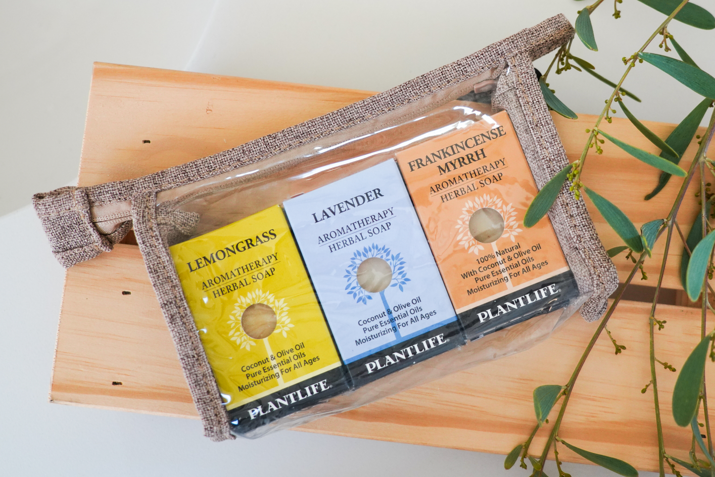 Plantlife Aromatherapy Herbal Soap 3-Pack in eco pouch, featuring Lemongrass, Lavender, and Frankincense Myrrh soaps made with coconut and olive oils and pure essential oils.