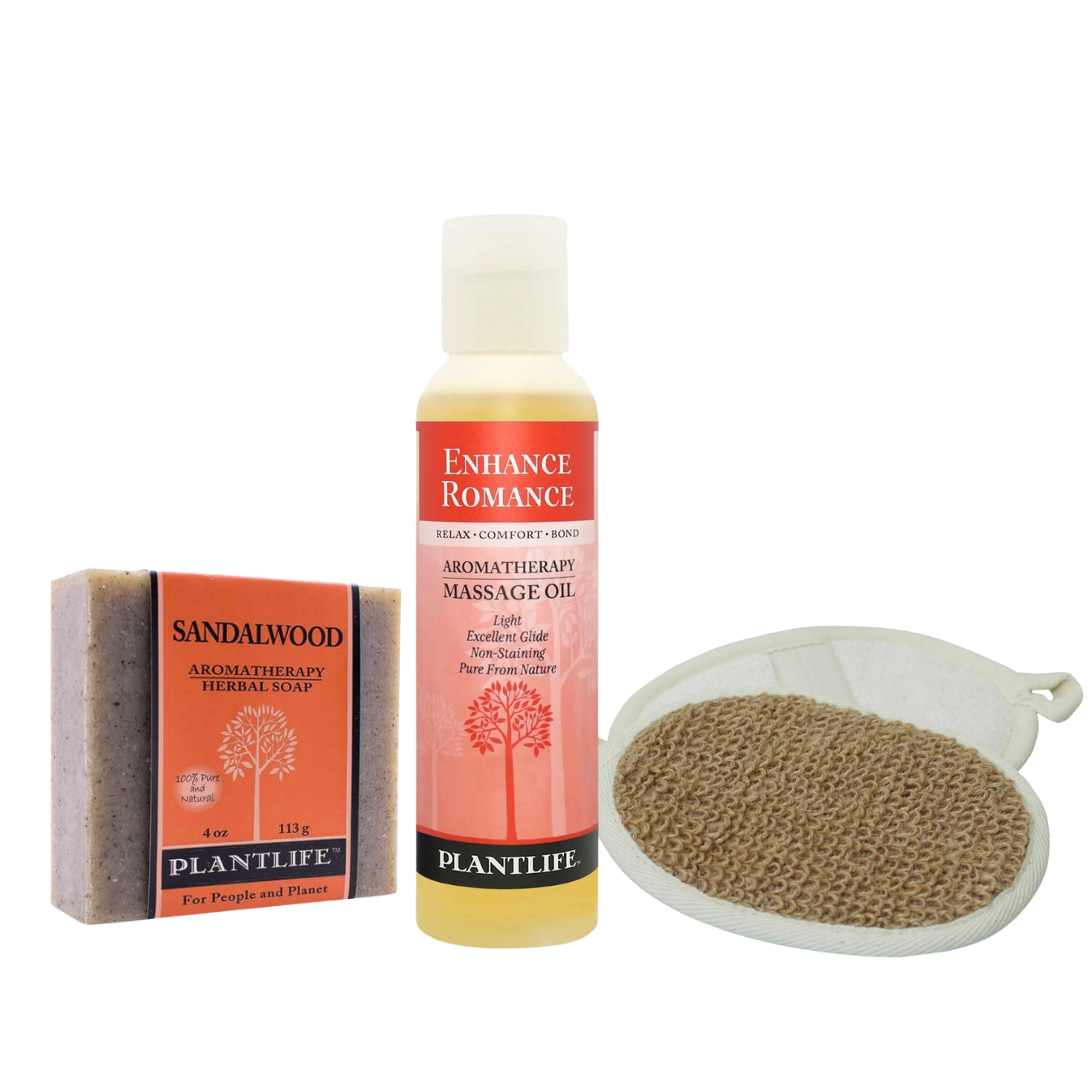 Plantlife Enhance Romance gift set featuring sandalwood aromatherapy soap, massage oil, and natural exfoliating heart-shaped bath mitt on transparent background