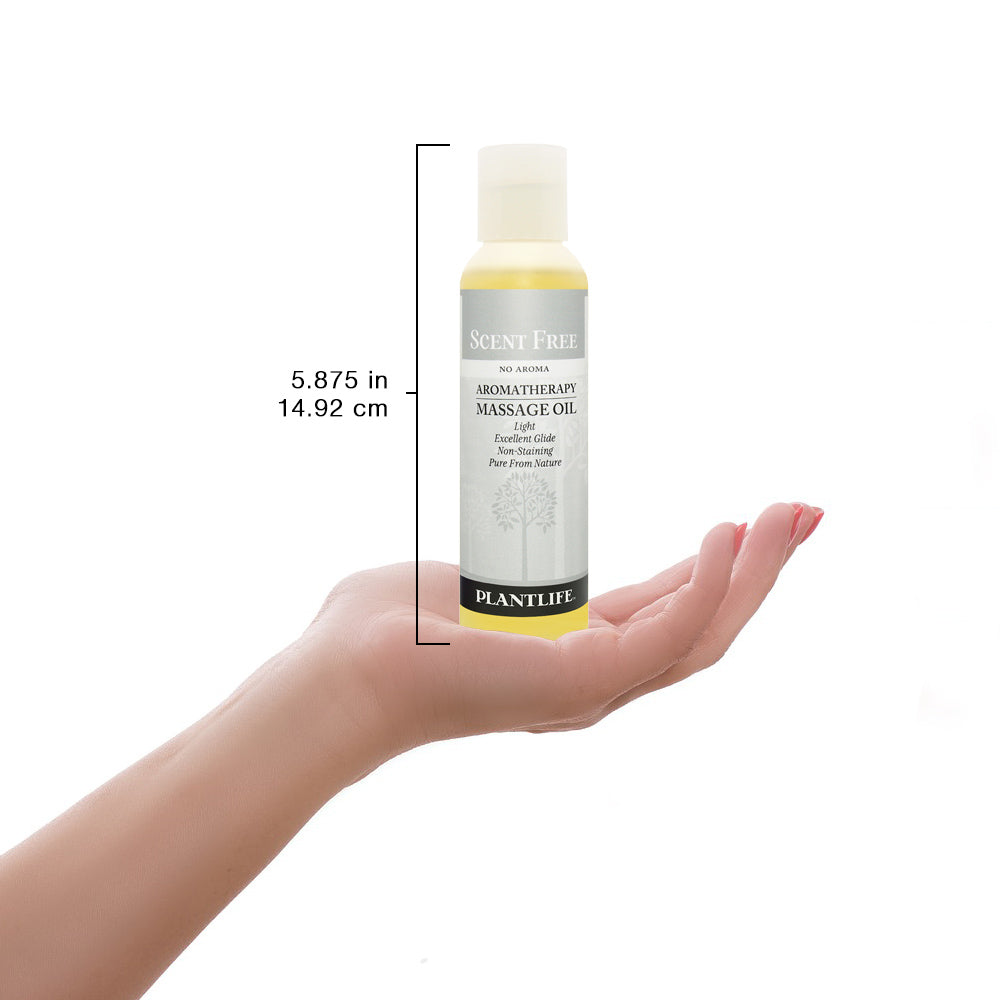 Plantlife Scent Free massage oil bottle shown with scale for size reference and unscented product details