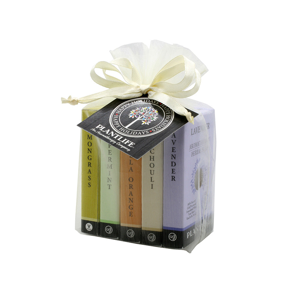 Plantlife Holiday Soap Sampler Gift Set featuring six aromatherapy herbal soaps—Lemongrass, Peppermint, Orange, Patchouli, and Lavender—wrapped in a sheer organza bag with a festive ribbon and holiday tag.