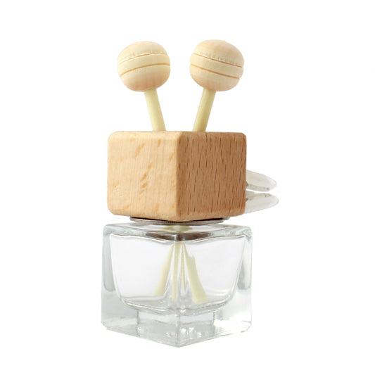 Plantlife Wooden Clip-On Car Diffuser β natural wood essential oil diffuser with dual ball sticks for passive aromatherapy on the go.