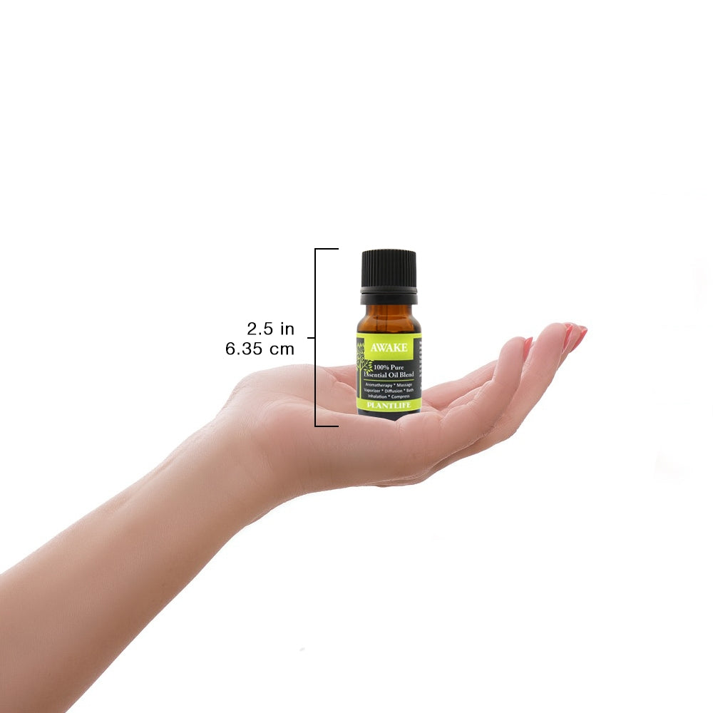 Awake Essential Oil Blend 10ml Bottle in Hand – Travel-Ready Size