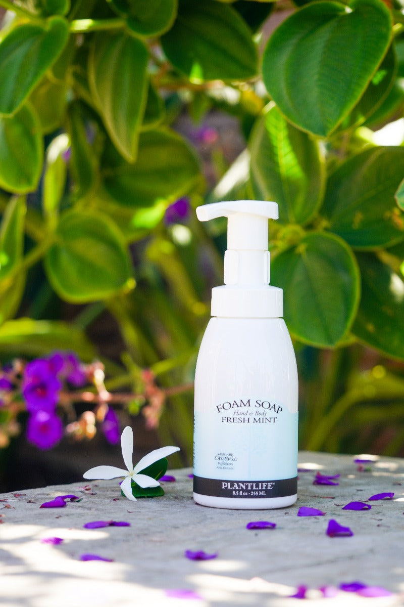 Fresh Mint Foam Soap bottle with suds shown during handwashing