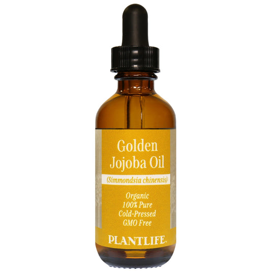 Amber glass bottle of 100% pure Golden Jojoba Oil by Plantlife