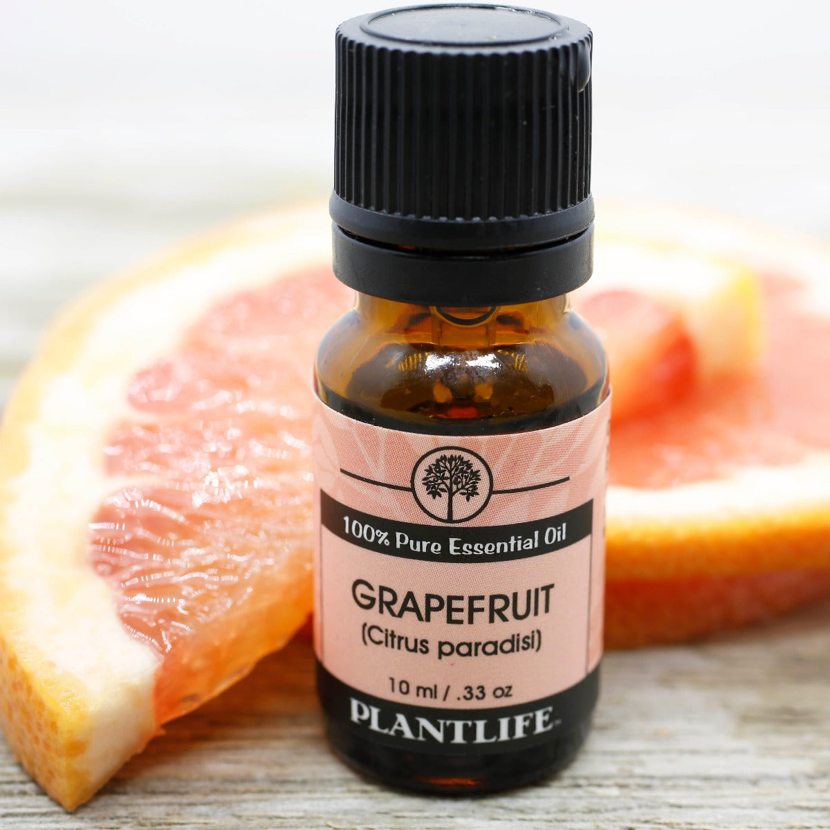 Plantlife Grapefruit Essential Oil bottle with vibrant citrus aroma