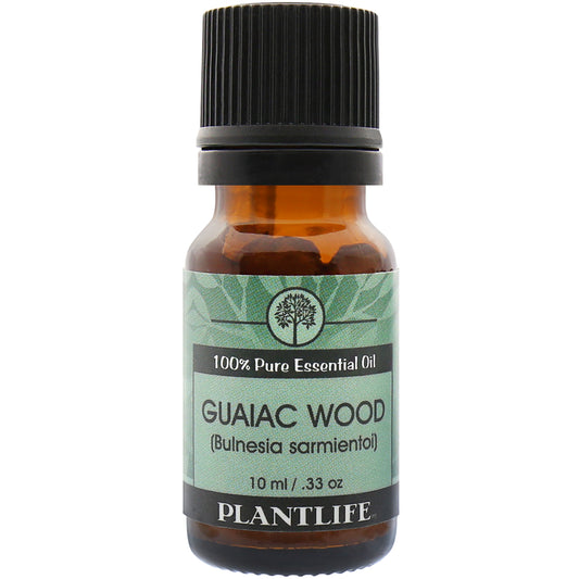 Plantlife Guaiac Wood Essential Oil bottle with smoky, woody scent