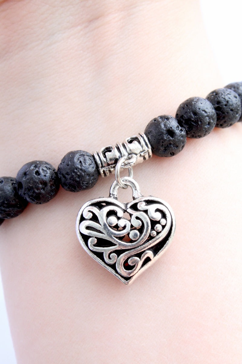 Plantlife aromatherapy bracelet lifestyle image with natural elements