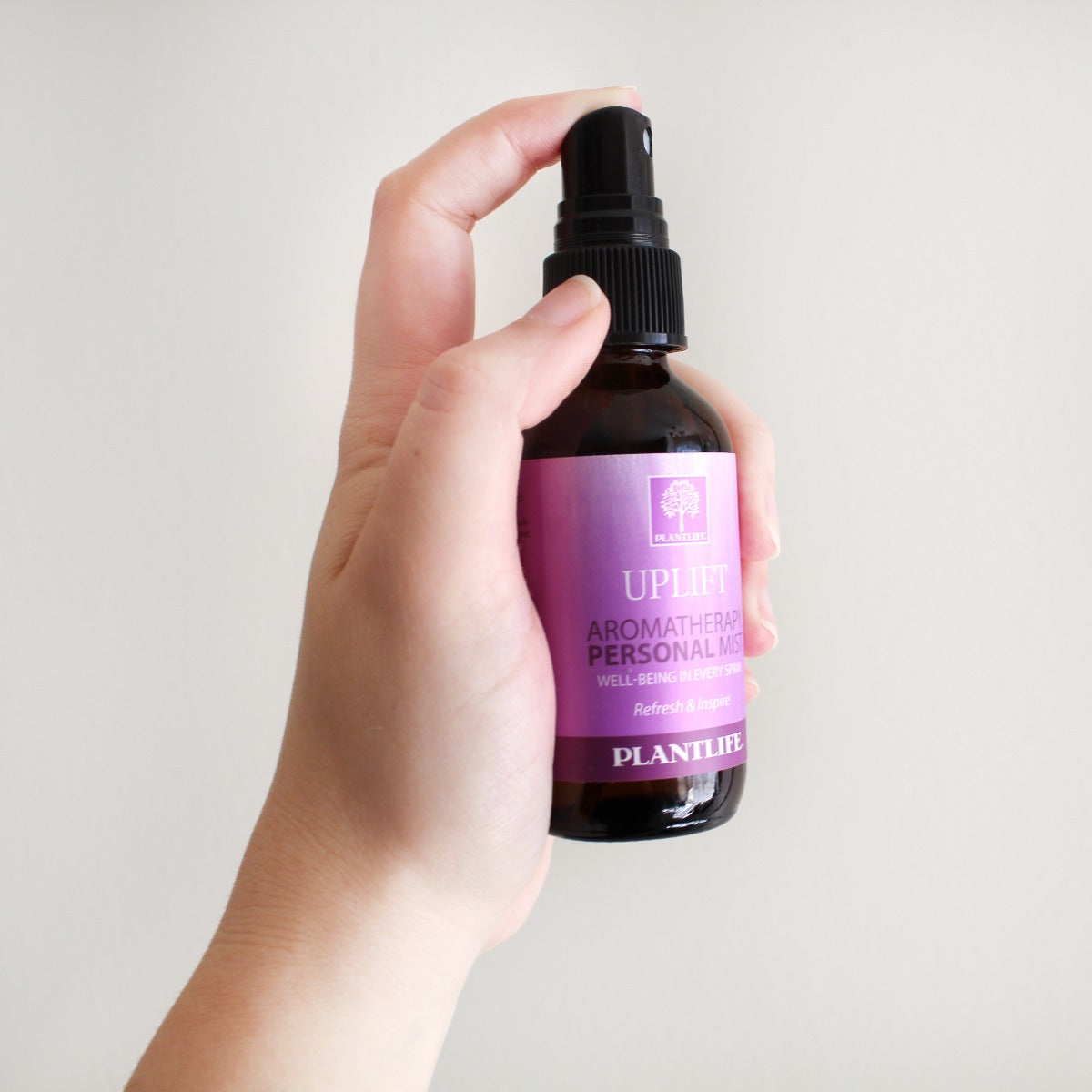 Plantlife Uplift Essential Oil Mist displayed in a serene, home environment
