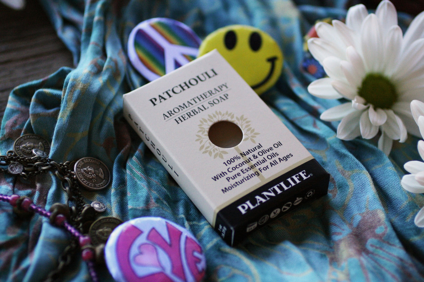 Alternate view of Patchouli Herbal Soap bar showing texture and packaging by Plantlife