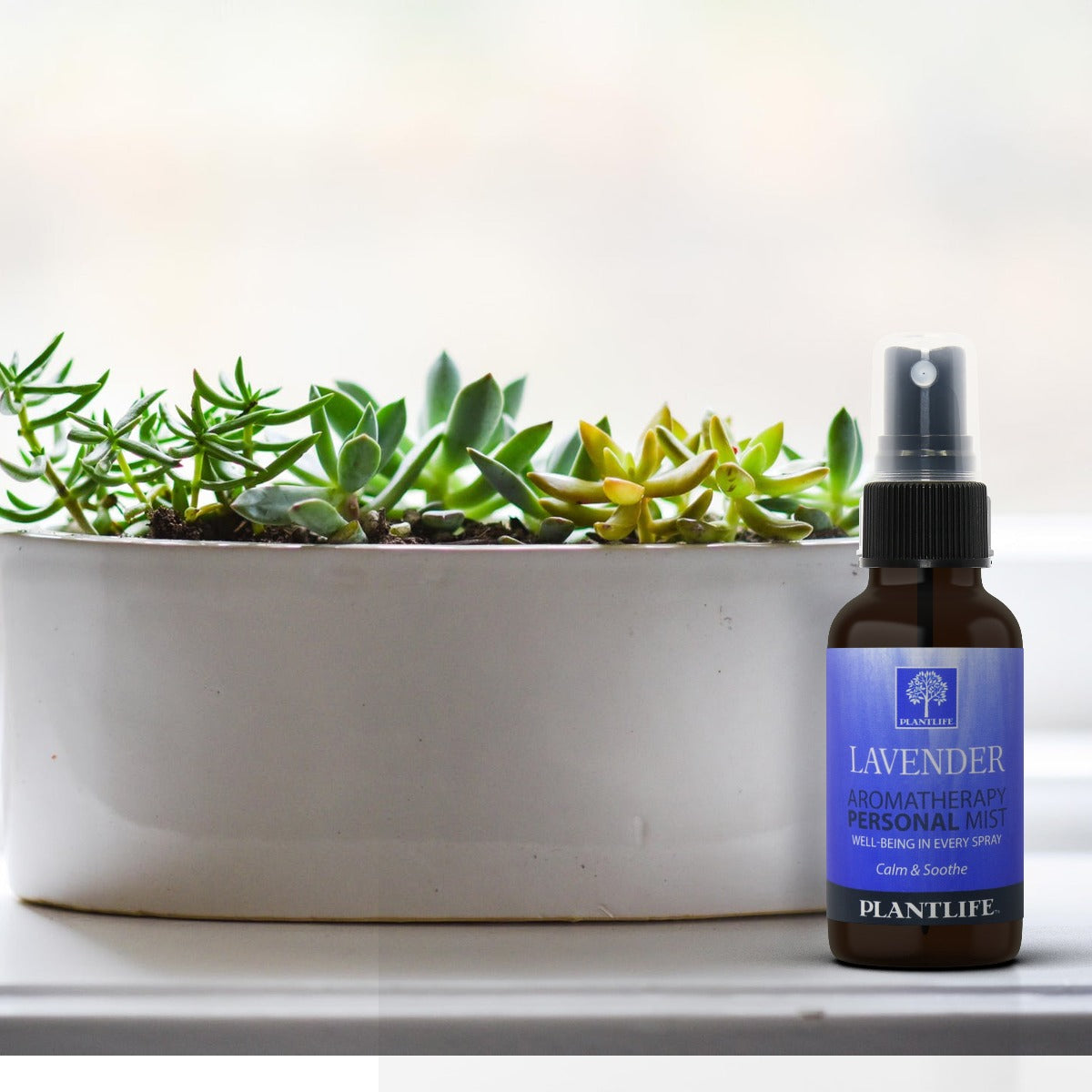 Plantlife Lavender Essential Oil Mist used for relaxation on a soft surface