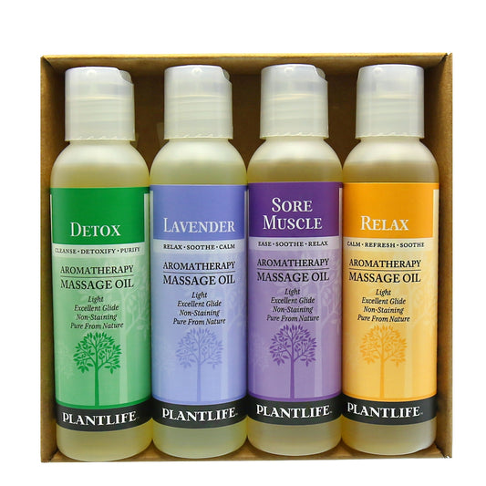 Massage oil 4-pack by Plantlife with Detox, Lavender, Relax, and Sore Muscle aromatherapy blends.