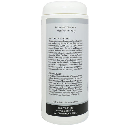 Back label of Plantlife Scent Free Therapeutic Mineral Bath Salt detailing benefits of mineral therapy and Celtic sea salt, with usage information and company contact details