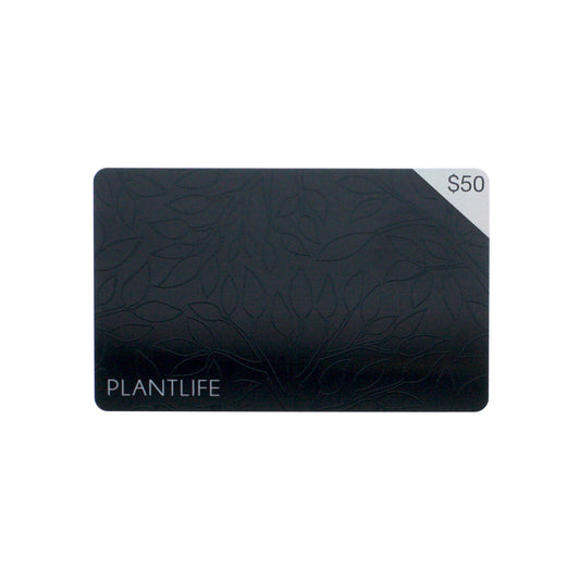 Plantlife $50 physical gift card with embossed leaf design on matte black background