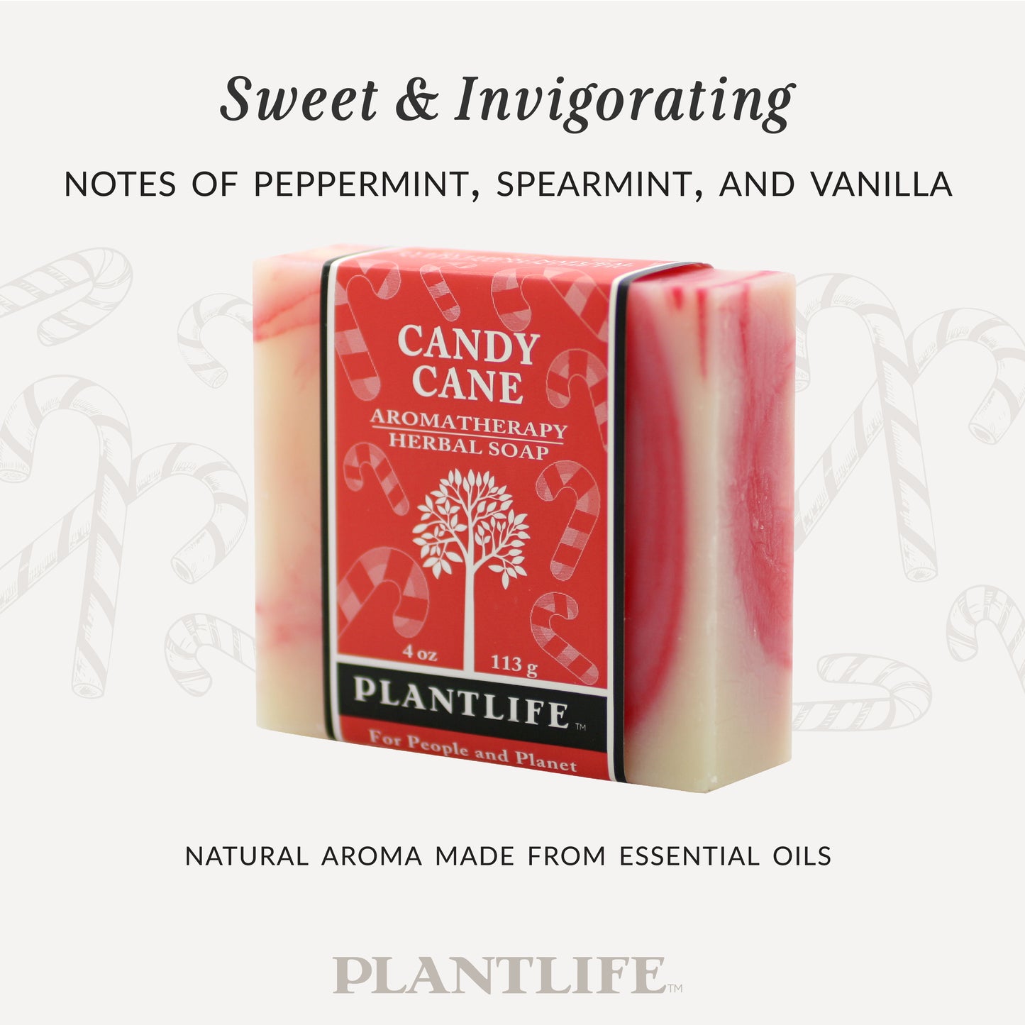Plantlife Candy Cane Aromatherapy Herbal Soap in red and white swirled design with matching red label. Text reads “Sweet & Invigorating – Notes of peppermint, spearmint, and vanilla” and “Natural aroma made from essential oils.”