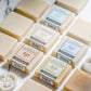 Various bars of soap with visible Plantae branding on a light background