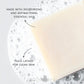 Close-up of a creamy white Plantlife soap bar resting in bubbly water. Text on the image highlights “Made with deodorizing and antibacterial essential oils” and “Thick lather for clean skin.” Natural aromatherapy soap handcrafted by Plantlife to cleanse and refresh the skin.