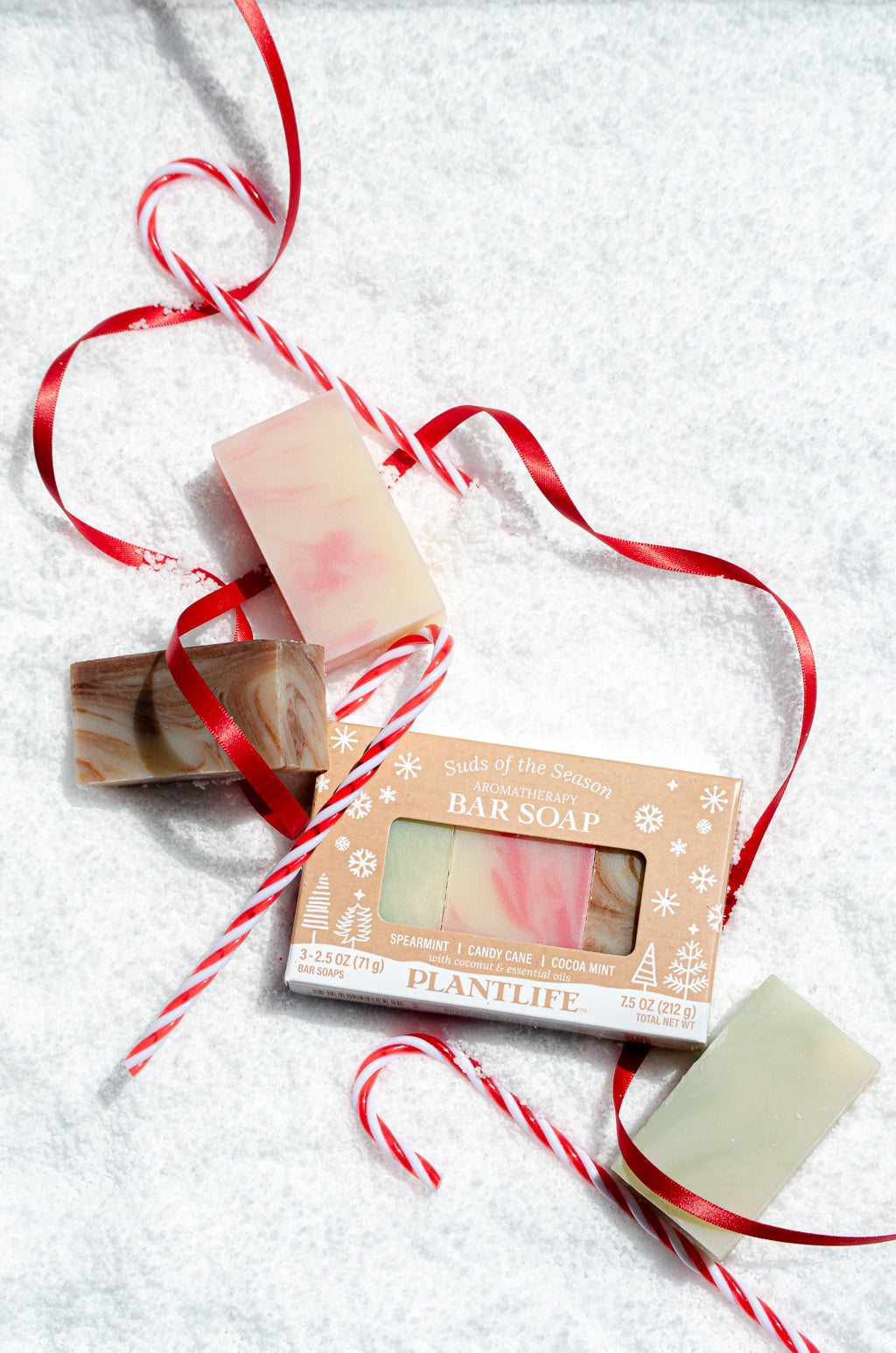 Holiday bar soap set by Plantlife in the snow.