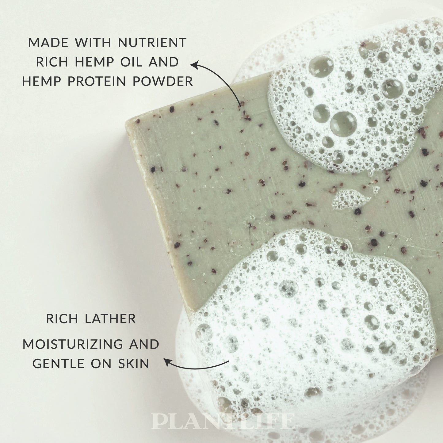 Plantlife Hemp Soap bar with visible hemp seeds and rich lather bubbles. Text reads “Made with nutrient-rich hemp oil and hemp protein powder” and “Rich lather moisturizing and gentle on skin.” Natural plant-based soap crafted to cleanse and condition with nourishing essential oils.
