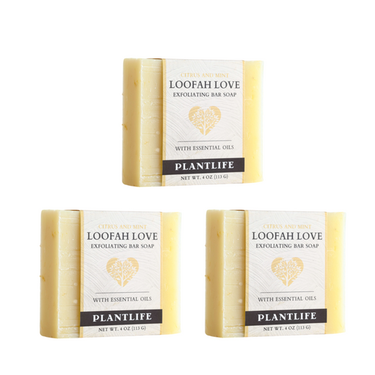Three bars of Plantlife Loofah Love Exfoliating Bar Soap on a white background