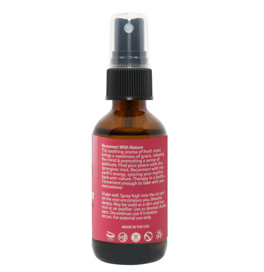 Back view of Plantlife Himalayan Rose Body & Hair Mist showing product description and usage directions on pink label
