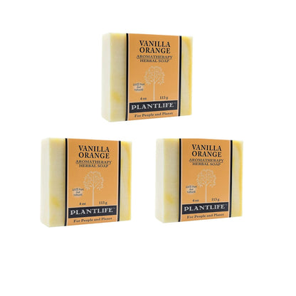 Three bars of Vanilla Orange Plantlife soap on a white background