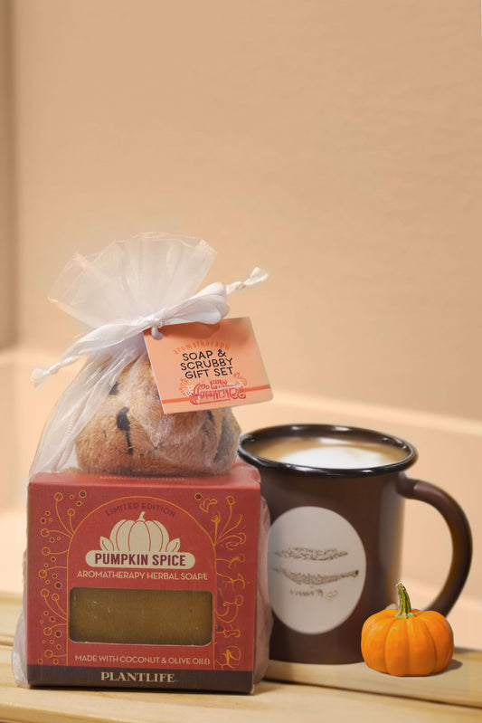 Pumpkin spice soap and Bear animal scrubber set with a mug and small pumpkin on a beige surface
